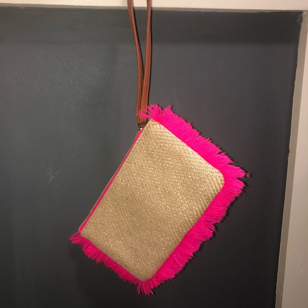 Patterned wristlet with pink fringe